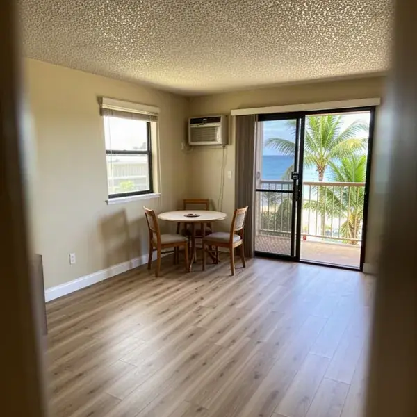 Acoustic-backed laminate floor in older Kihei condo