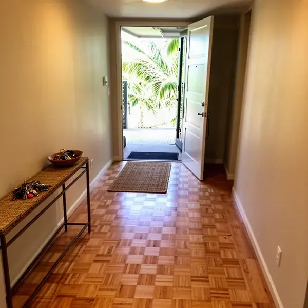 Basketweave parquet floor in Honokowai condo hallway