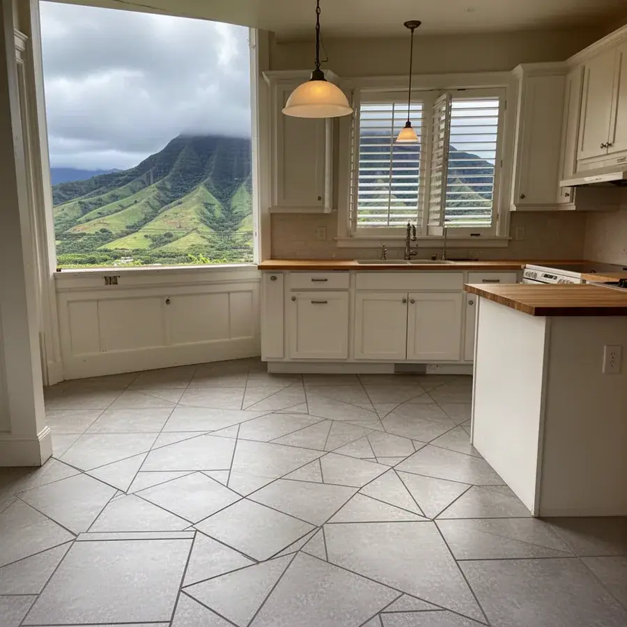 Large-format tile set flat after the old tile came out Flat new porcelain tile floor in Wailuku home kitchen