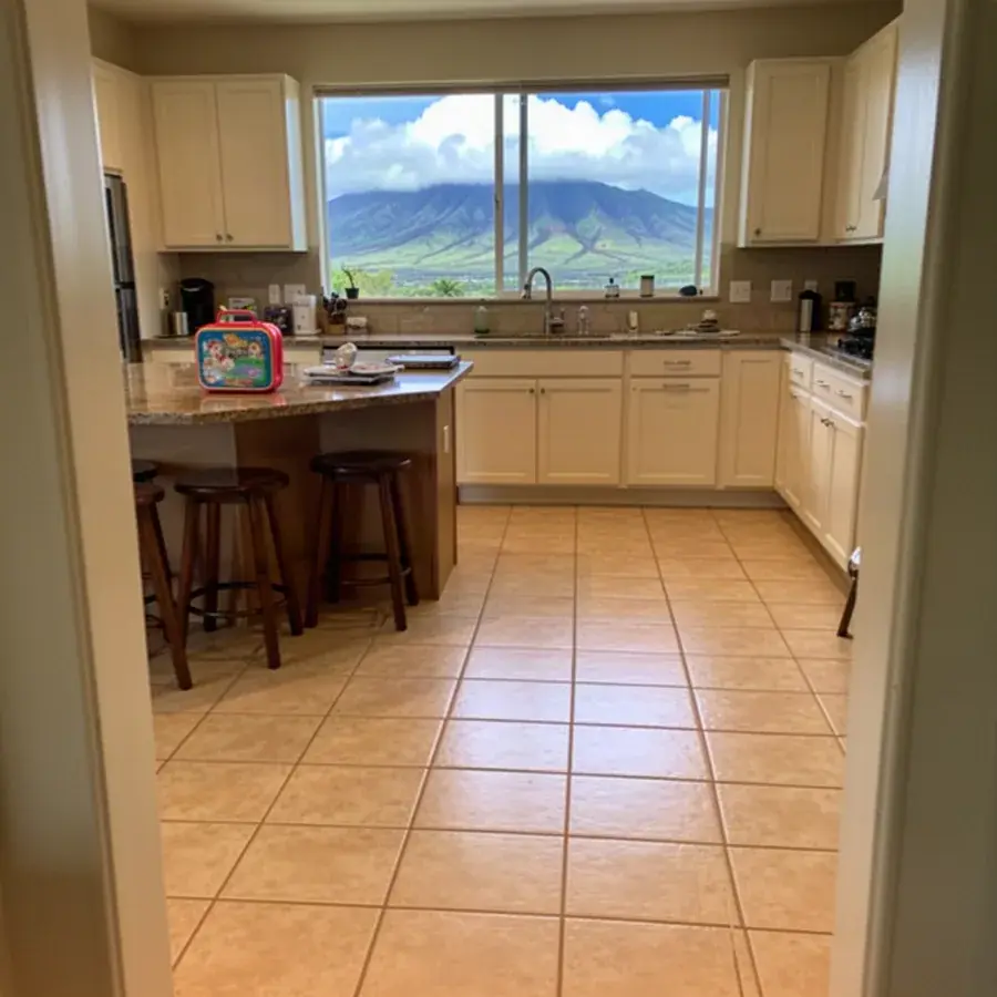 Budget-friendly ceramic tile in a family kitchen Glazed ceramic tile kitchen floor in Waikapu family home