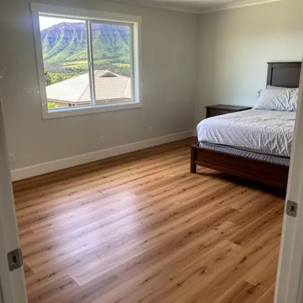 Glue-down vinyl plank in new Lahaina home bedroom