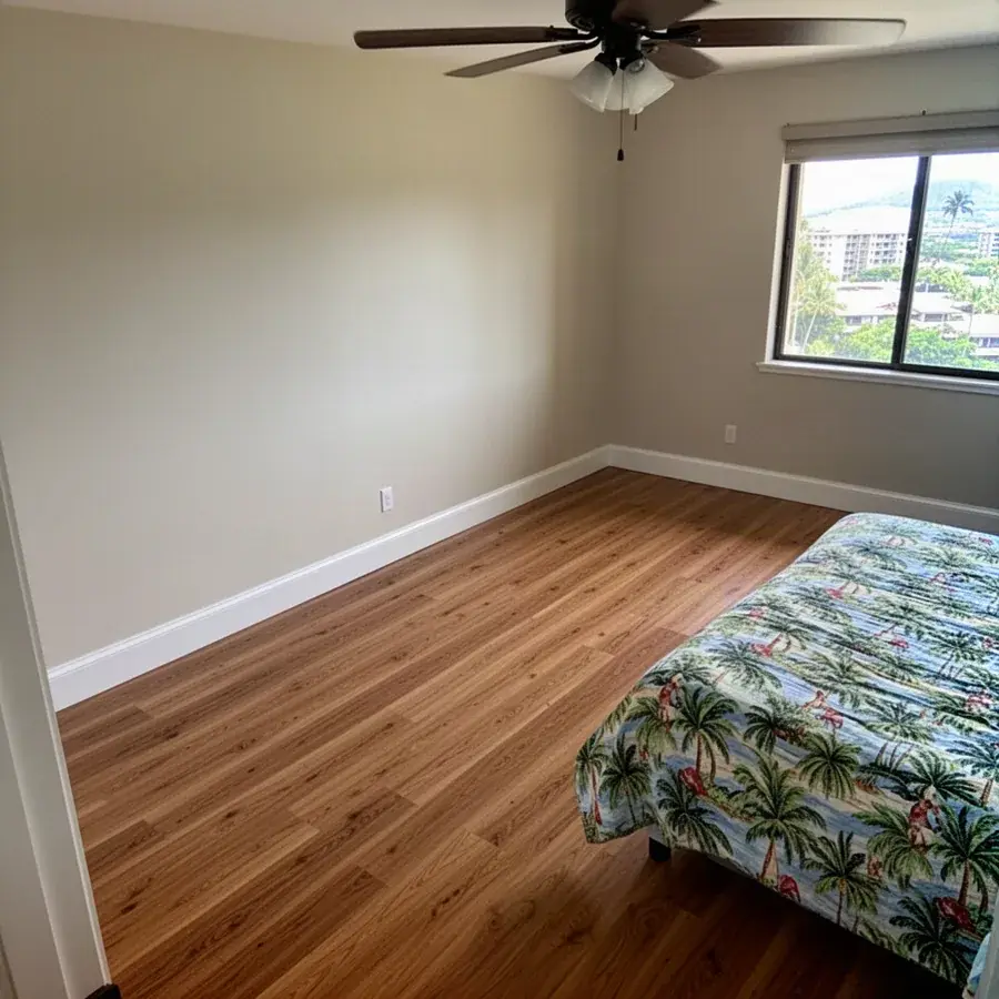 Seamless replaced laminate planks in Kahana condo bedroom