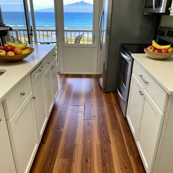 Seamlessly repaired vinyl plank floor in Kahana rental kitchen